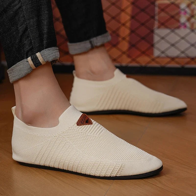 Top-down view of men's AirKnit breathable comfort slip-on shoes. Lightweight casual sneakers.