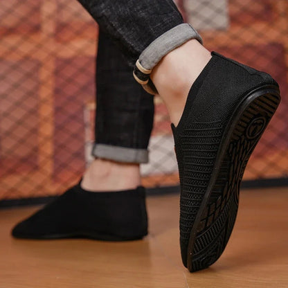 Men's AirKnit breathable slip-on shoes. Lightweight, comfortable walking sneakers for easy wear.