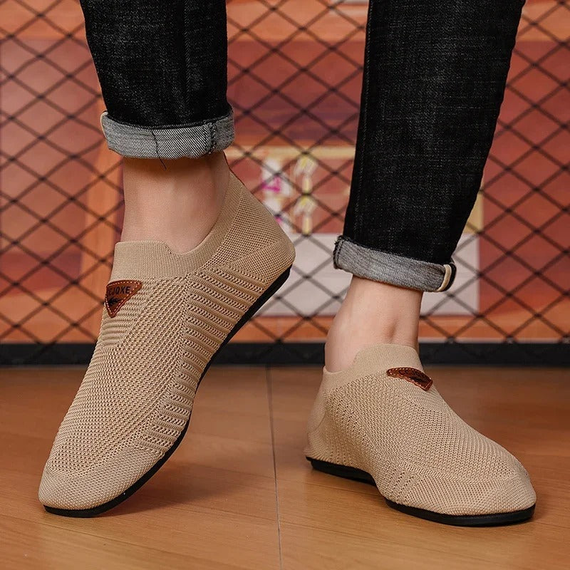 Men's AirKnit breathable comfort slip-on shoes. Lightweight casual sneakers for walking and easy wear.