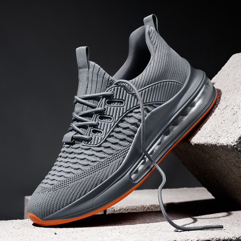 Side profile of gray Airvault Max men's sport shoes, engineered for superior running.