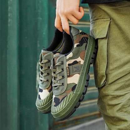 Military style men's camo tactical sneakers, durable all-terrain footwear for outdoor exploration.