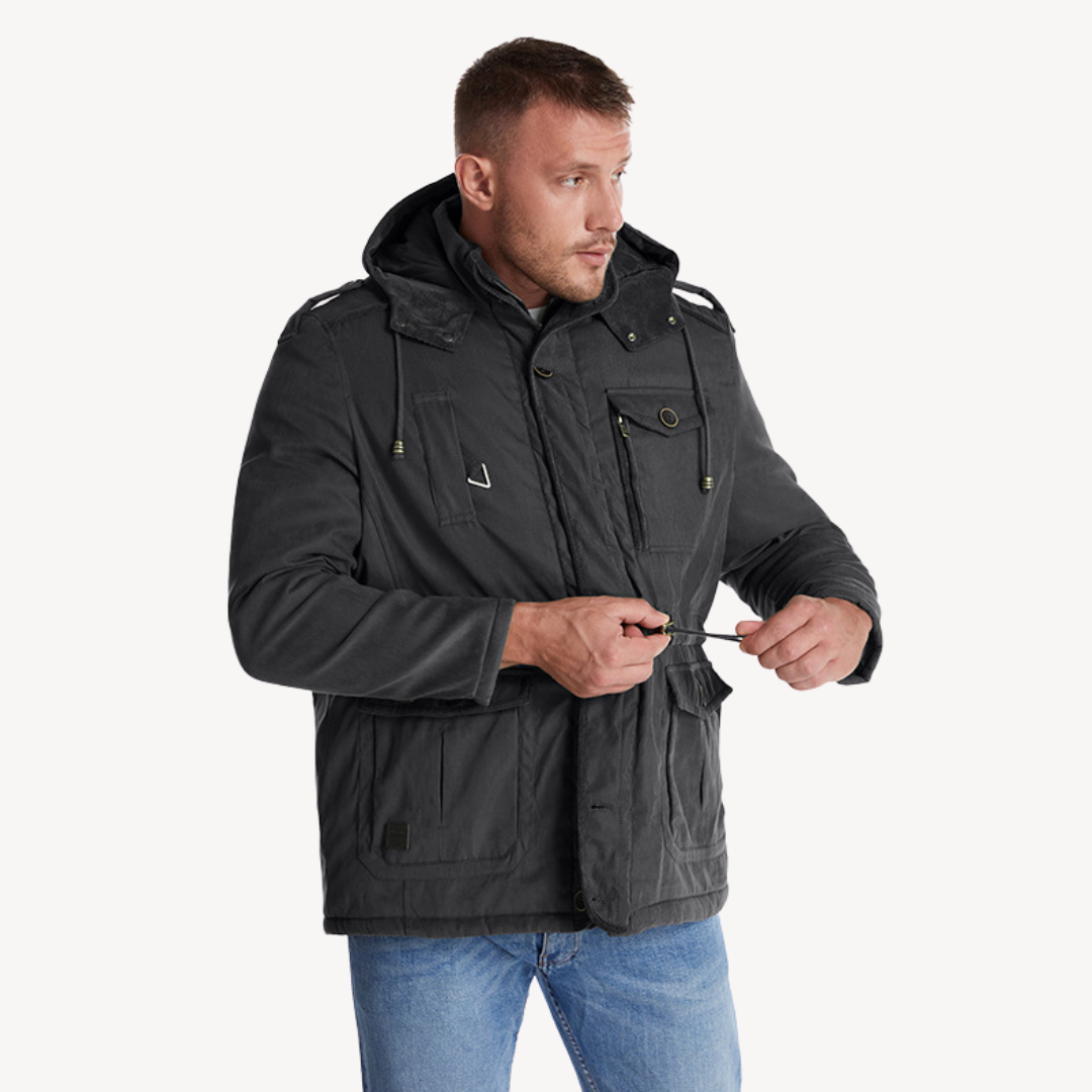 Weatherproof men's utility jacket. Multi-pocket design, hooded, ideal for outdoor activities.