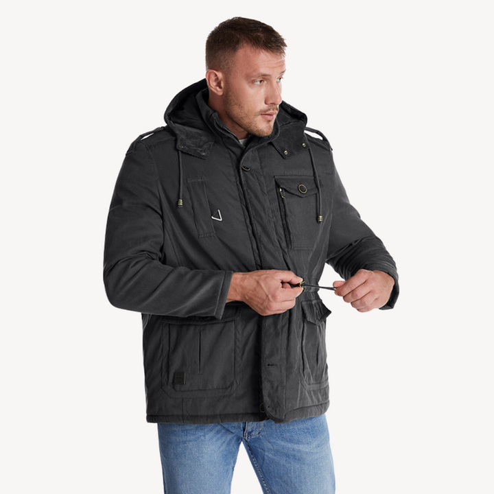Weatherproof men's utility jacket. Multi-pocket design, hooded, ideal for outdoor activities.