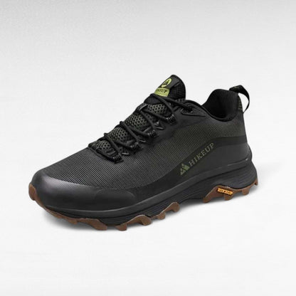 Side view of men's outdoor hiking boots, highlighting waterproof design and sturdy construction.