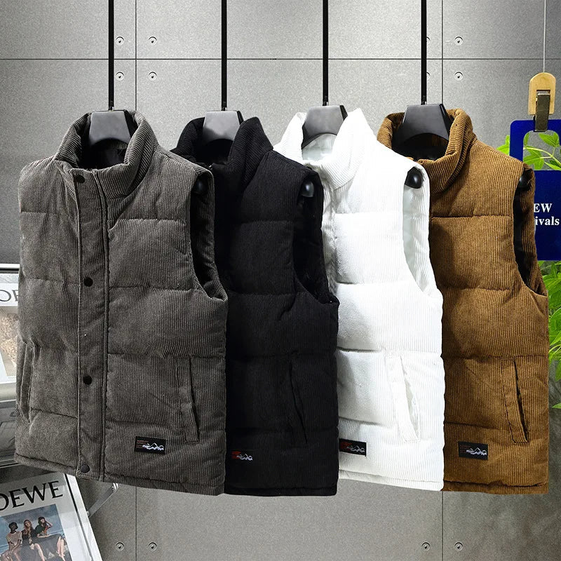 Men's Alpine ribbed puffer vest in black, perfect for layering & winter fashion.