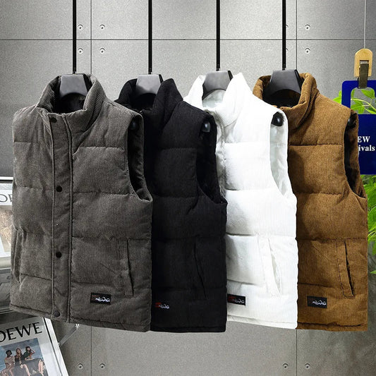 Men's Alpine ribbed puffer vest in black, perfect for layering & winter fashion.