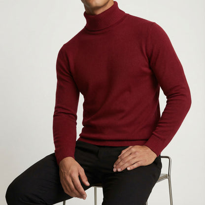 Dark grey men's alpine turtleneck sweater, a versatile men's top for elegant winter fashion and smart casual.