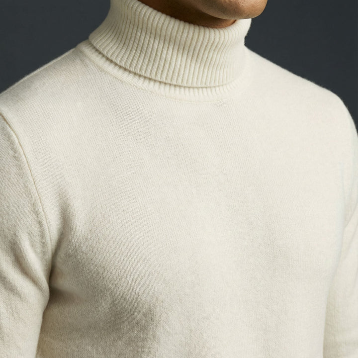 High-quality men's alpine knit turtleneck sweater. A cozy essential for cold weather & stylish layering.