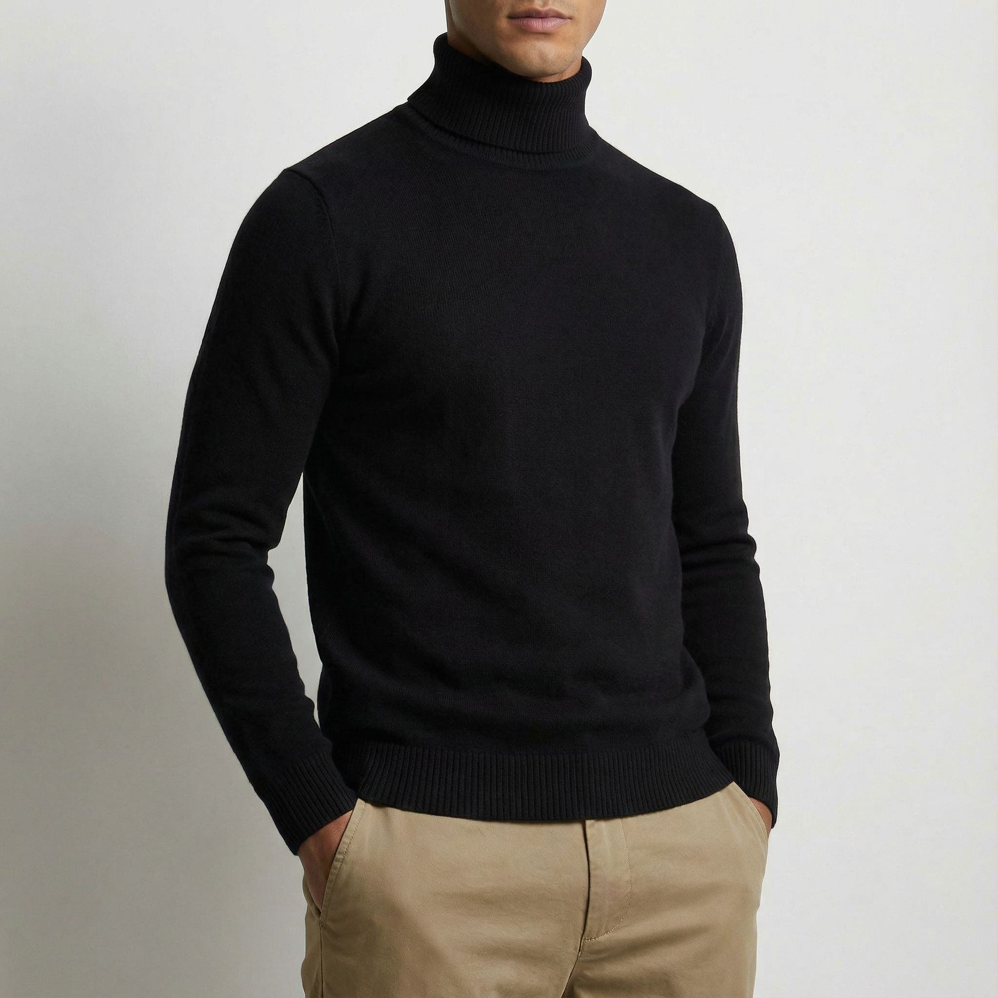 Close-up of a men's alpine turtleneck sweater, showcasing its cozy knit texture and elegant style.