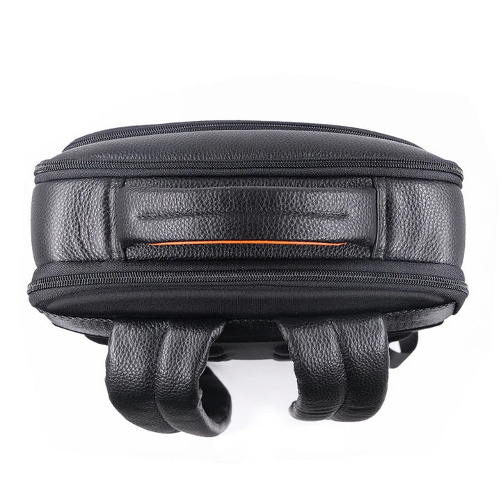 Stylish men's genuine leather anti-theft backpack, featuring fingerprint security for daily commute.