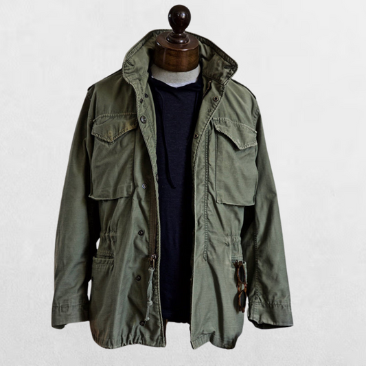 Men's Archer field jacket with hood, rugged outdoor utility style for versatile wear. Durable men's outerwear.