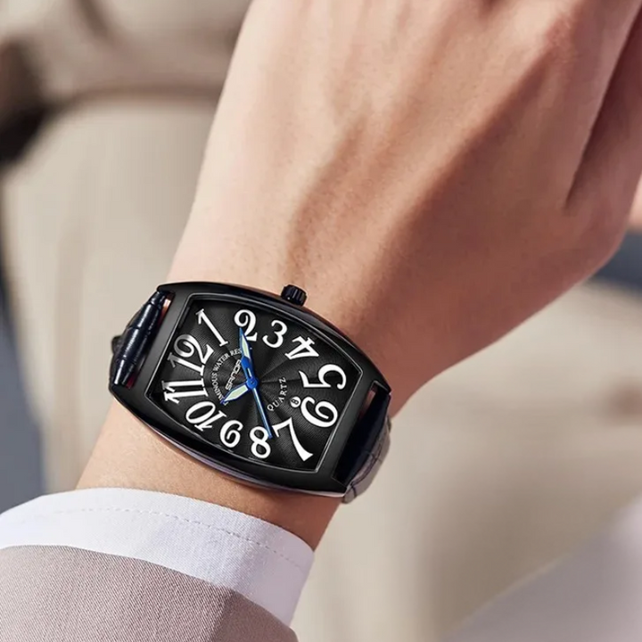 Formal men's Art Deco timepiece, tonneau silhouette, black leather band.