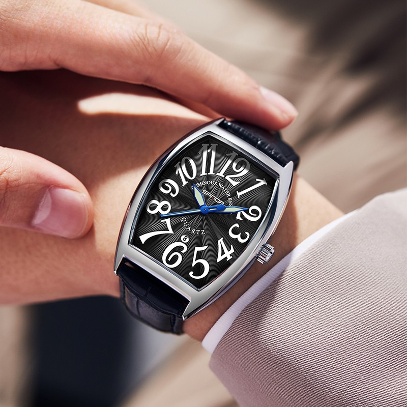 Art Deco inspired men's tonneau watch, elegant dial, quality leather strap.