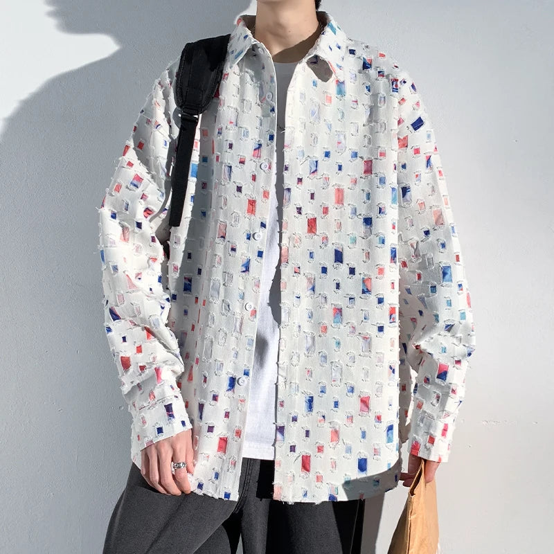 Close-up of a colorful men's artisan pattern casual shirt, showcasing its unique design & lightweight fabric.