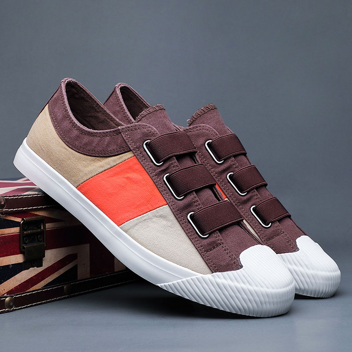Modern men's fashion sneakers, impressionist design, lightweight and comfortable for any day.