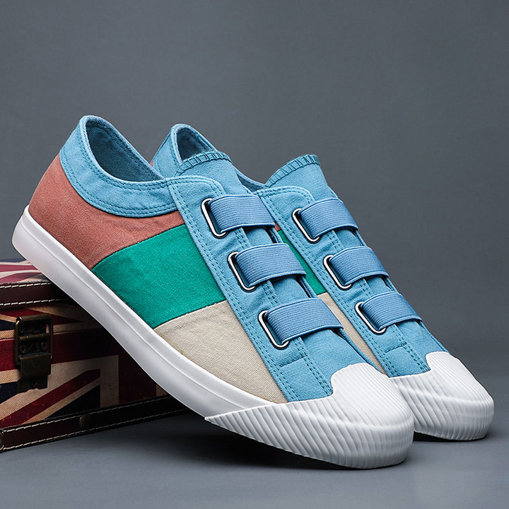Fashionable men's artistic sneakers, comfortable for casual wear with unique impressionist flair.