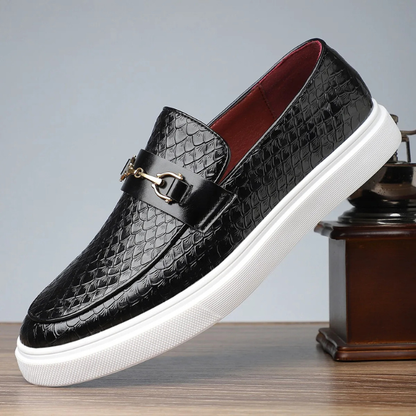 Stylish men's Aureo loafers with embossed snakeskin & gold accent. Perfect for smart casual or formal looks.