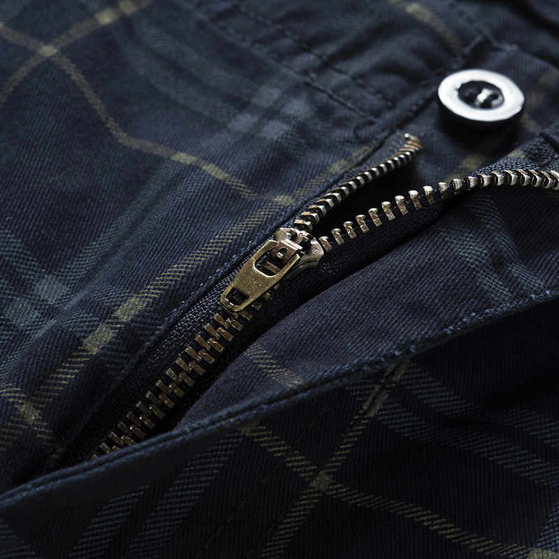 Stylish men's check pattern cargo shorts. Great for adventure, travel, and summer fashion.