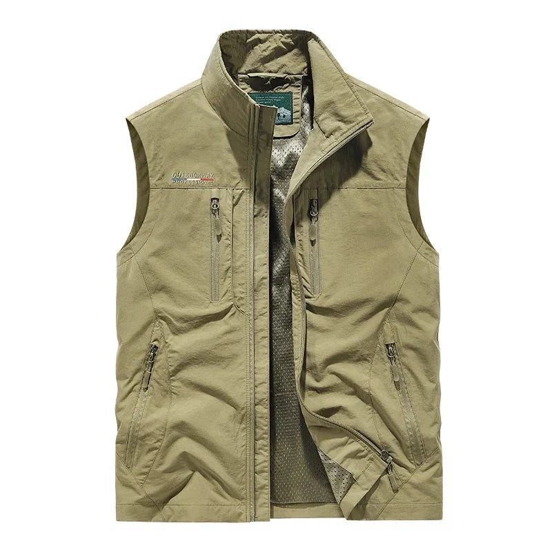 Breathable men's utility vest, lightweight for travel & hiking, with ample pockets for outdoor essentials.