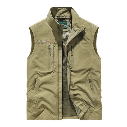 Breathable men's utility vest, lightweight for travel & hiking, with ample pockets for outdoor essentials.