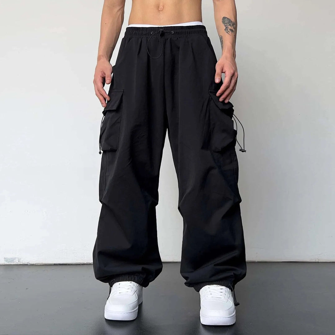 Comfortable men's baggy parachute cargo pants, perfect for Y2K streetwear & casual hip hop style.