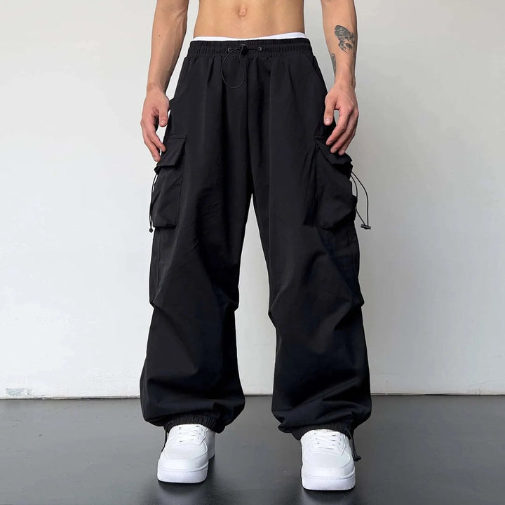 Comfortable men's baggy parachute cargo pants, perfect for Y2K streetwear & casual hip hop style.