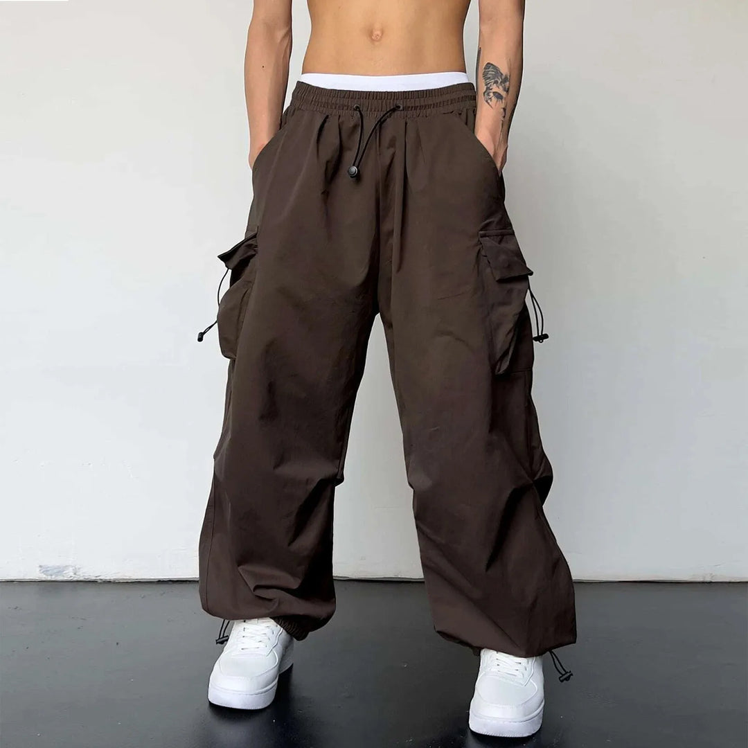 Men's loose fit baggy parachute cargo pants, a comfortable streetwear staple for modern casual wear.