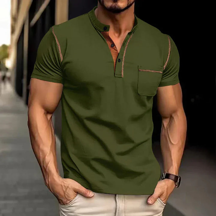 Man wearing a versatile band collar polo shirt. Modern fit short sleeve casual top for men's summer fashion.