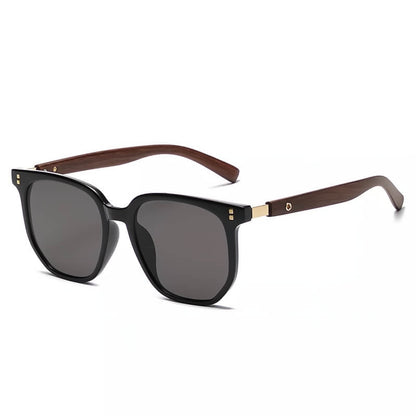Sleek Barcelona men's sunglasses featuring natural wood frames & polarized lenses for optimal glare protection.