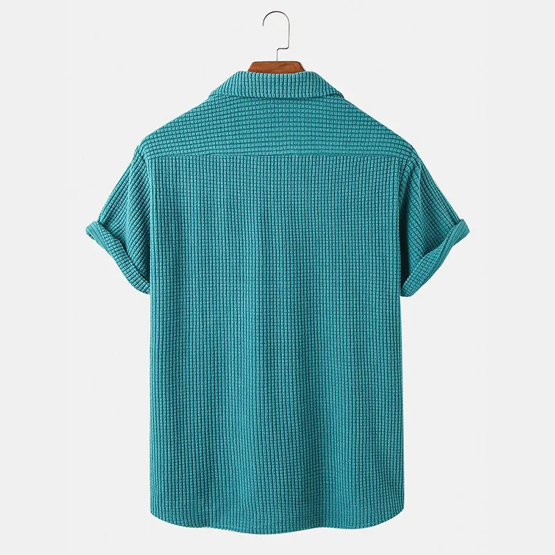 Casual men's long sleeve waffle button-up shirt, perfect for everyday wear.