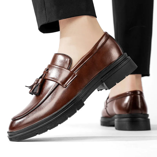 Men's Belmont Tassel Loafers in polished leather, perfect for formal or smart casual fashion.