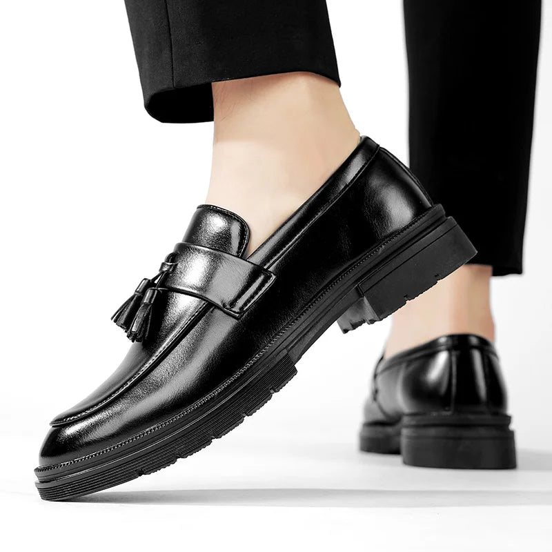 Classic men's tassel loafers, offering sophisticated polished style and easy slip-on comfort.
