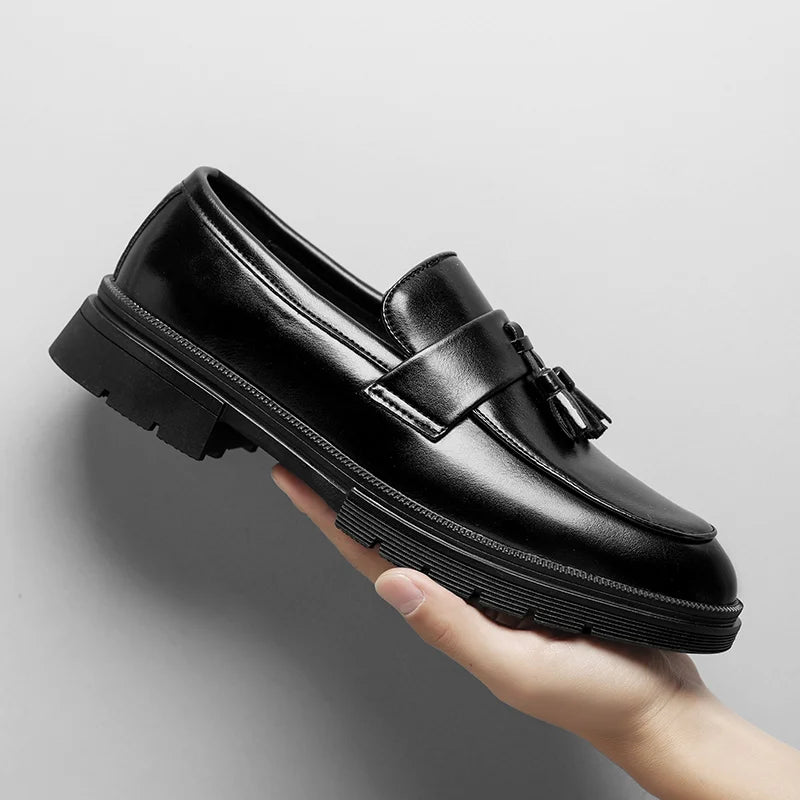 High-quality men's formal footwear: Belmont Tassel Loafers with durable traction sole.