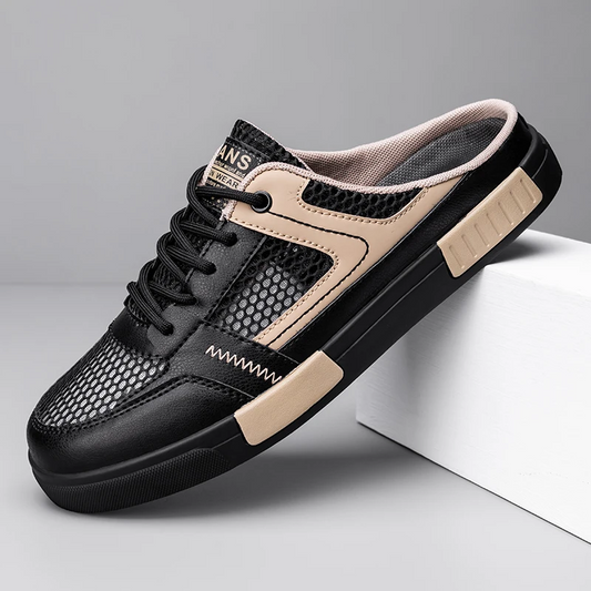 Men's black comfortable sneaker slides, offering effortless slip-on style & casual everyday wear.