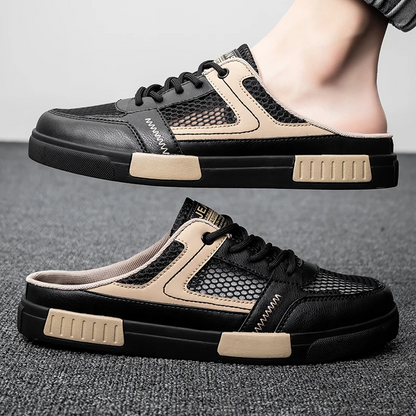 Stylish men's black sneaker slides with modern design, perfect casual footwear for everyday comfort.