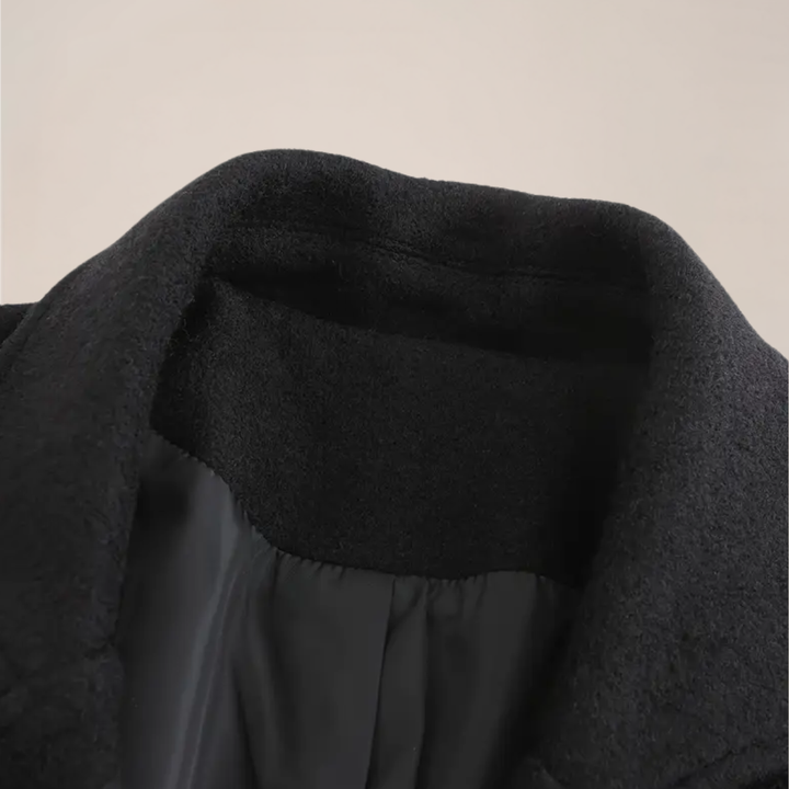 Elegant men's black double-breasted long overcoat, perfect tailored winter outerwear for business fashion.