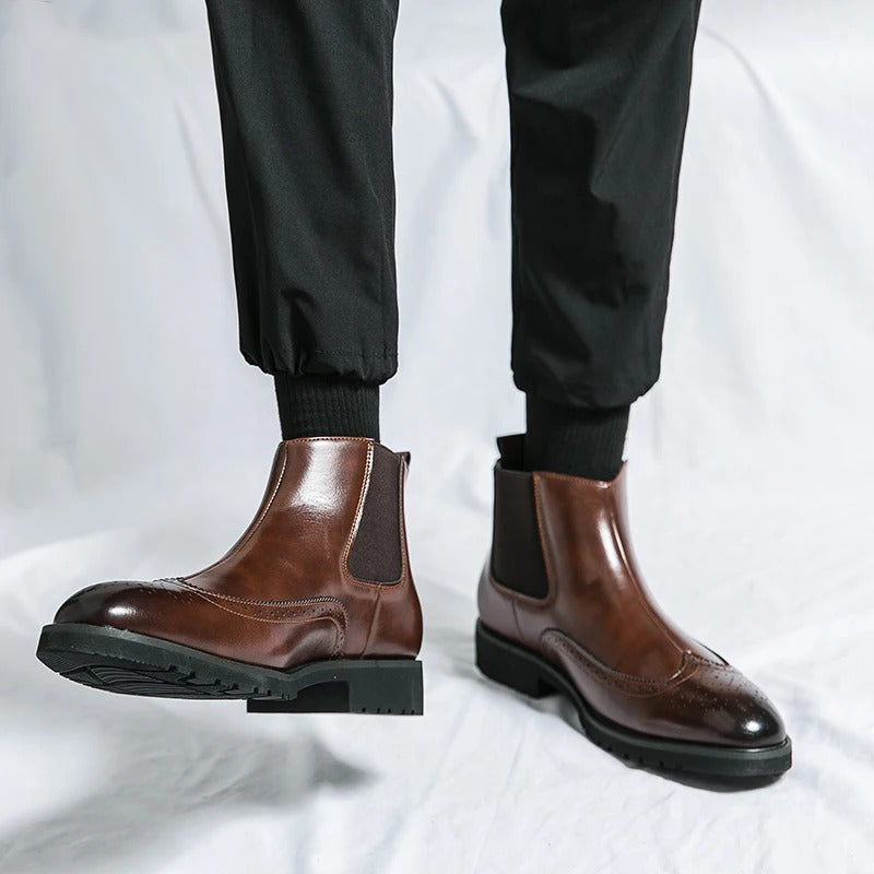 Men's black Chelsea dress boots, sleek and comfortable for formal events or smart office wear.