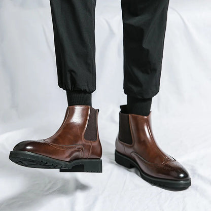 Men's black Chelsea dress boots, sleek and comfortable for formal events or smart office wear.