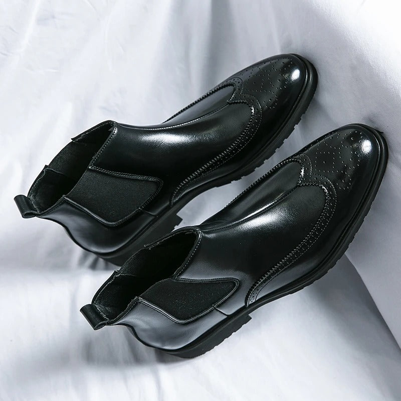 Stylish men's brown Chelsea boots, a comfortable staple for versatile men's fashion.