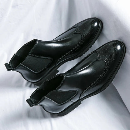 Stylish men's brown Chelsea boots, a comfortable staple for versatile men's fashion.