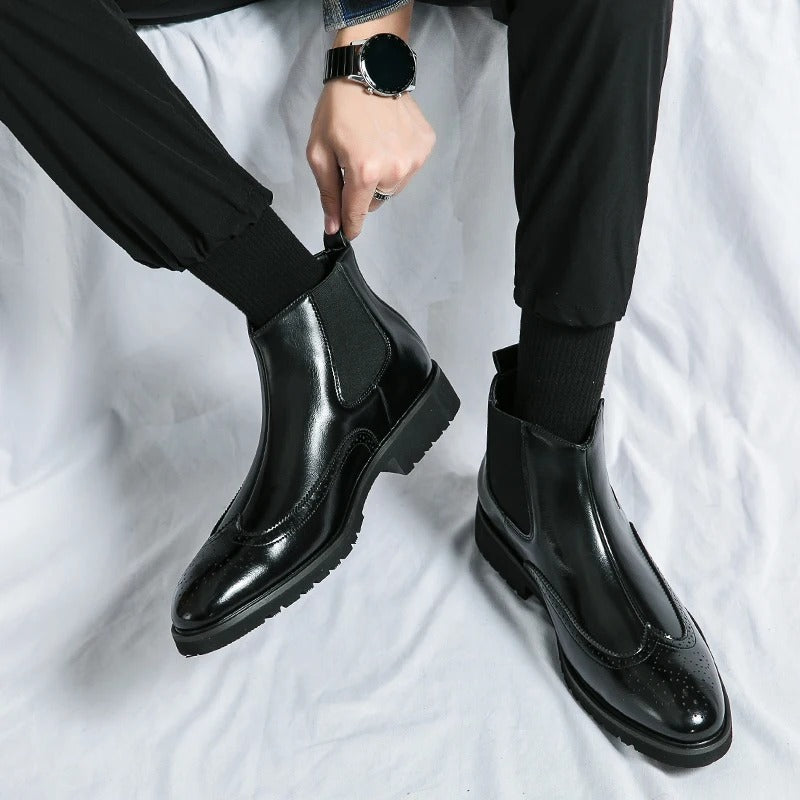 Classic men's brown Chelsea boots, a comfortable and stylish choice for any contemporary man.
