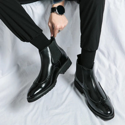 Classic men's brown Chelsea boots, a comfortable and stylish choice for any contemporary man.