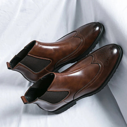 Classic brown men's Chelsea ankle boots, versatile stylish footwear for casual or dressy occasions.