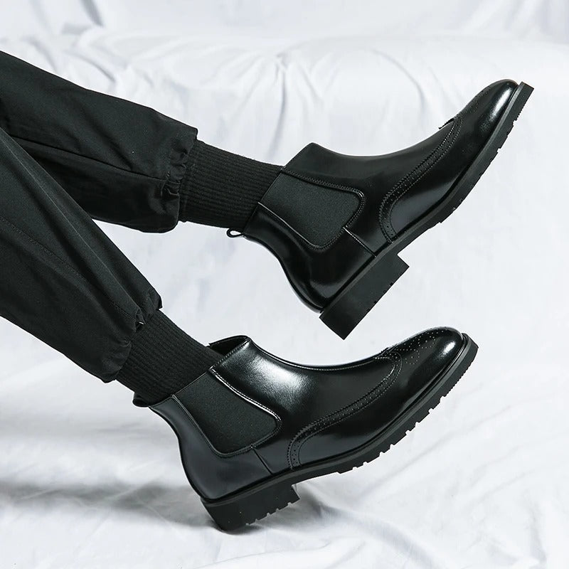 Men's sleek black Chelsea boots, providing ultimate comfort and a sharp, fashionable appearance.