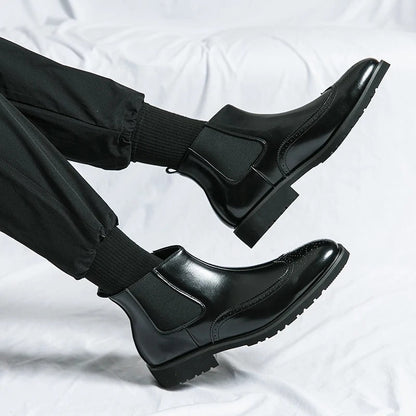 Men's sleek black Chelsea boots, providing ultimate comfort and a sharp, fashionable appearance.