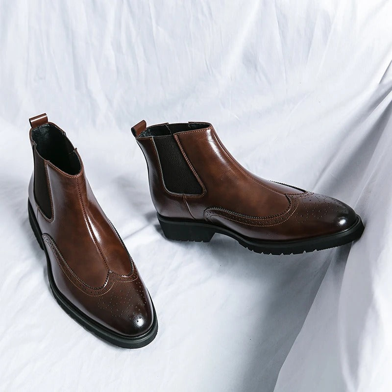 Stylish men's black brogue Chelsea boots, combining classic detail with modern comfort and appeal.