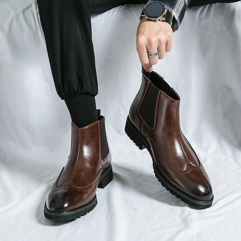 Men's elegant black Chelsea boots, ideal dress boots for sophisticated style and all-day comfort.