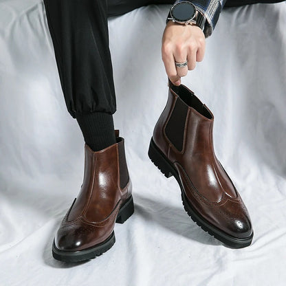 Men's elegant black Chelsea boots, ideal dress boots for sophisticated style and all-day comfort.