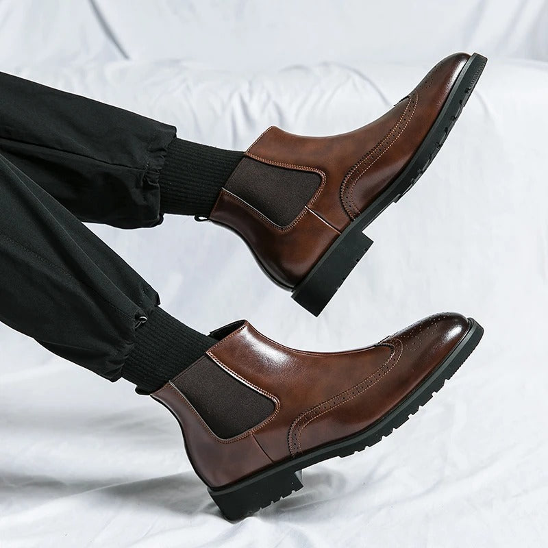Stylish men's brown leather Chelsea boots, offering a timeless look with slip-on ease & comfort.
