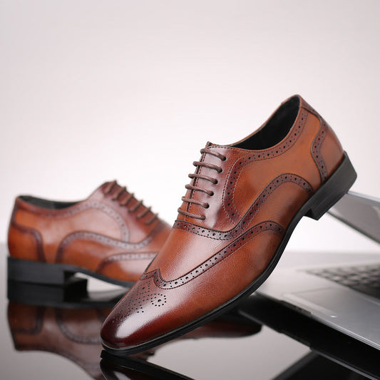 Men's black leather Oxford brogue dress shoes, perfect for formal and business occasions.